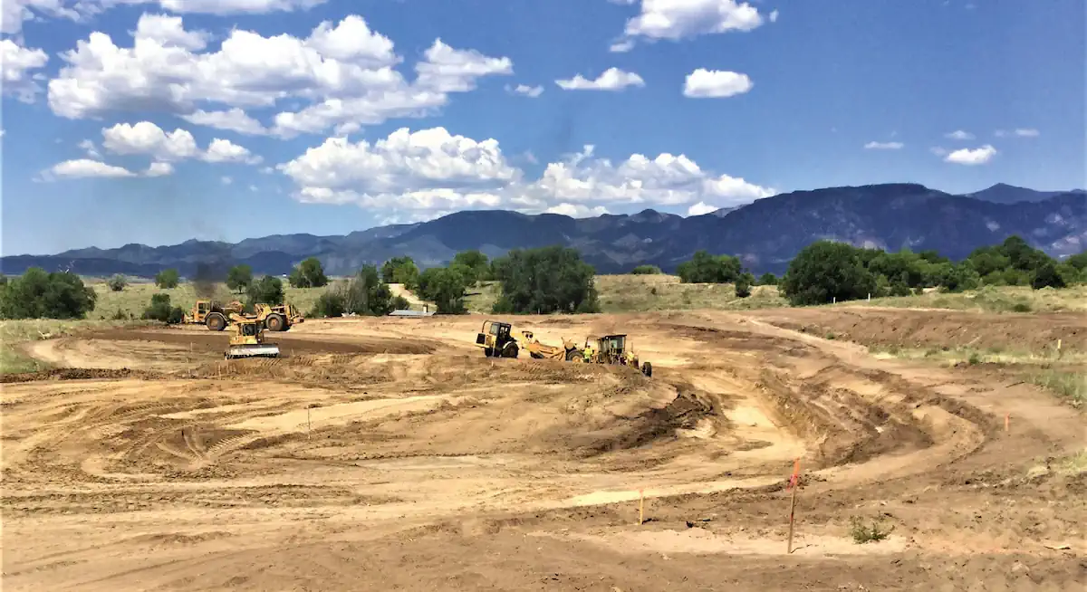 Mining for suitable soil for athletic center